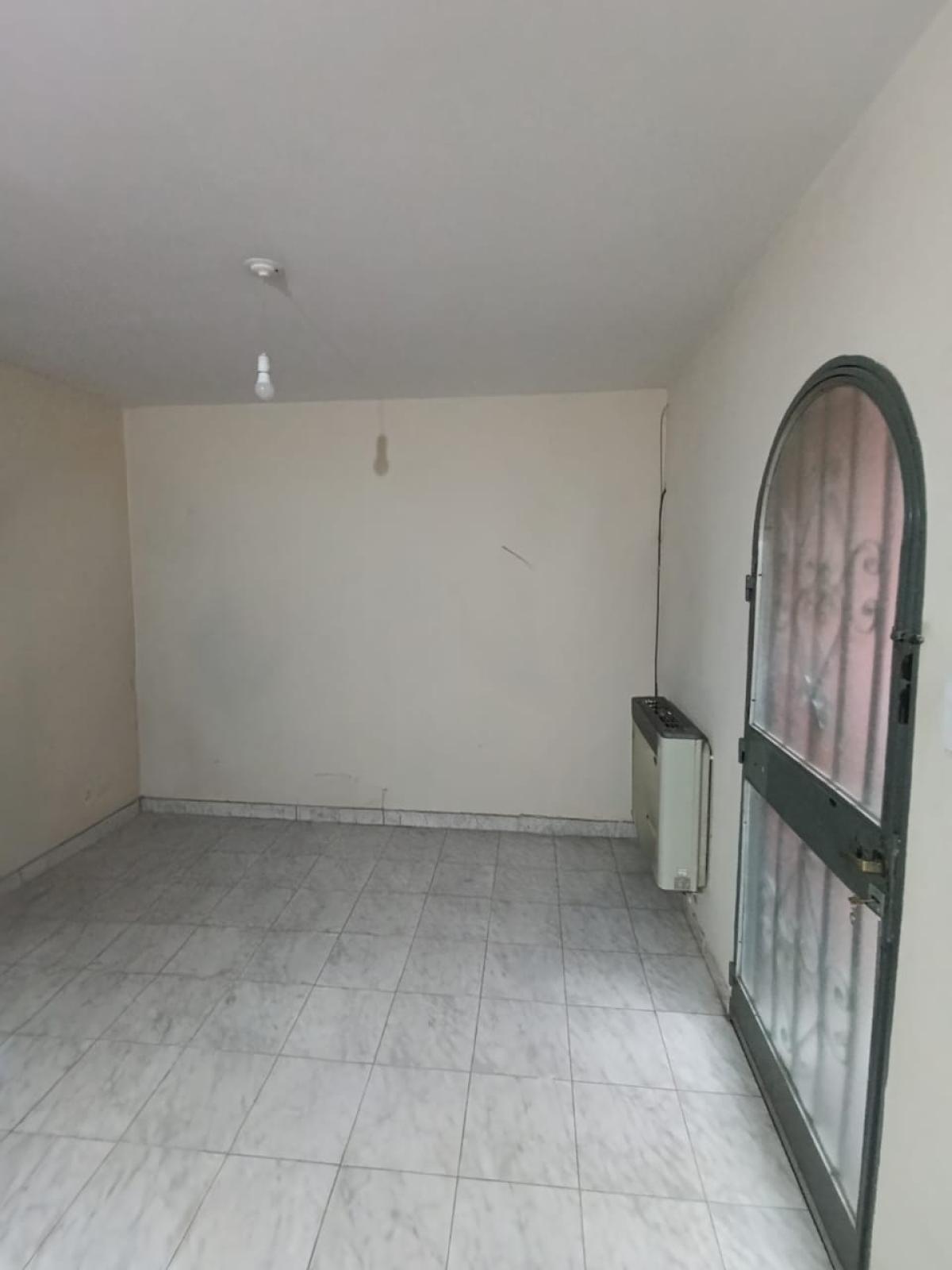 SE VENDE 2 LOCALES COMERCIALES Y 2 DEPARTAMENTOS EN ARROYITO (ZONA CENTRO)